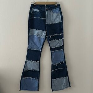 Distressed Wide Leg Patched Denim Jeans